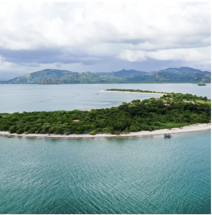 John Wayne Island with Ocean Ranches Panama land behind